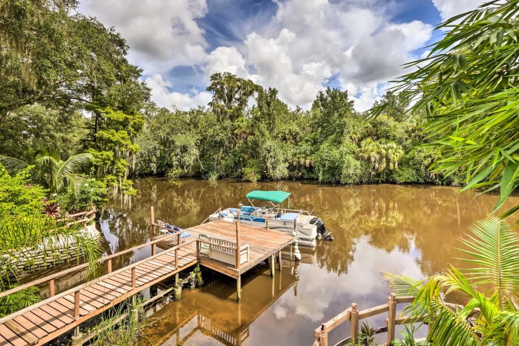 Lush Riverfront Escape with Private Boat Dock!